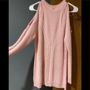 Light pink sweater with cut out/open shoulders.